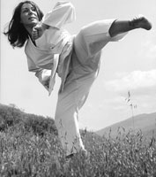 Alice executing a karate move! Livermore, CA (1974)