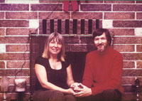 Merry Christmas! Richie and Alice sitting in front of the fireplace (1980)